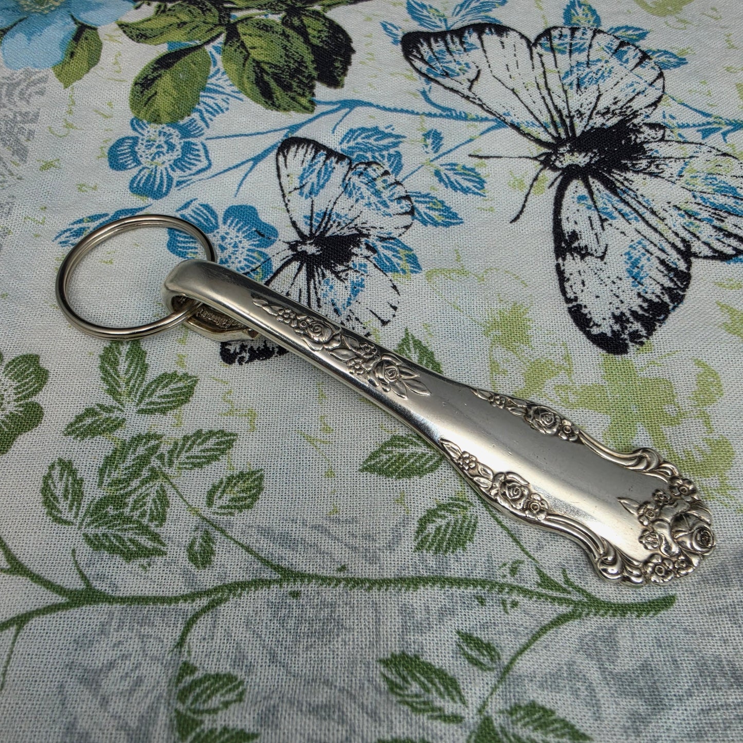 Holiday (1951) Pattern Silver Plated Keychain