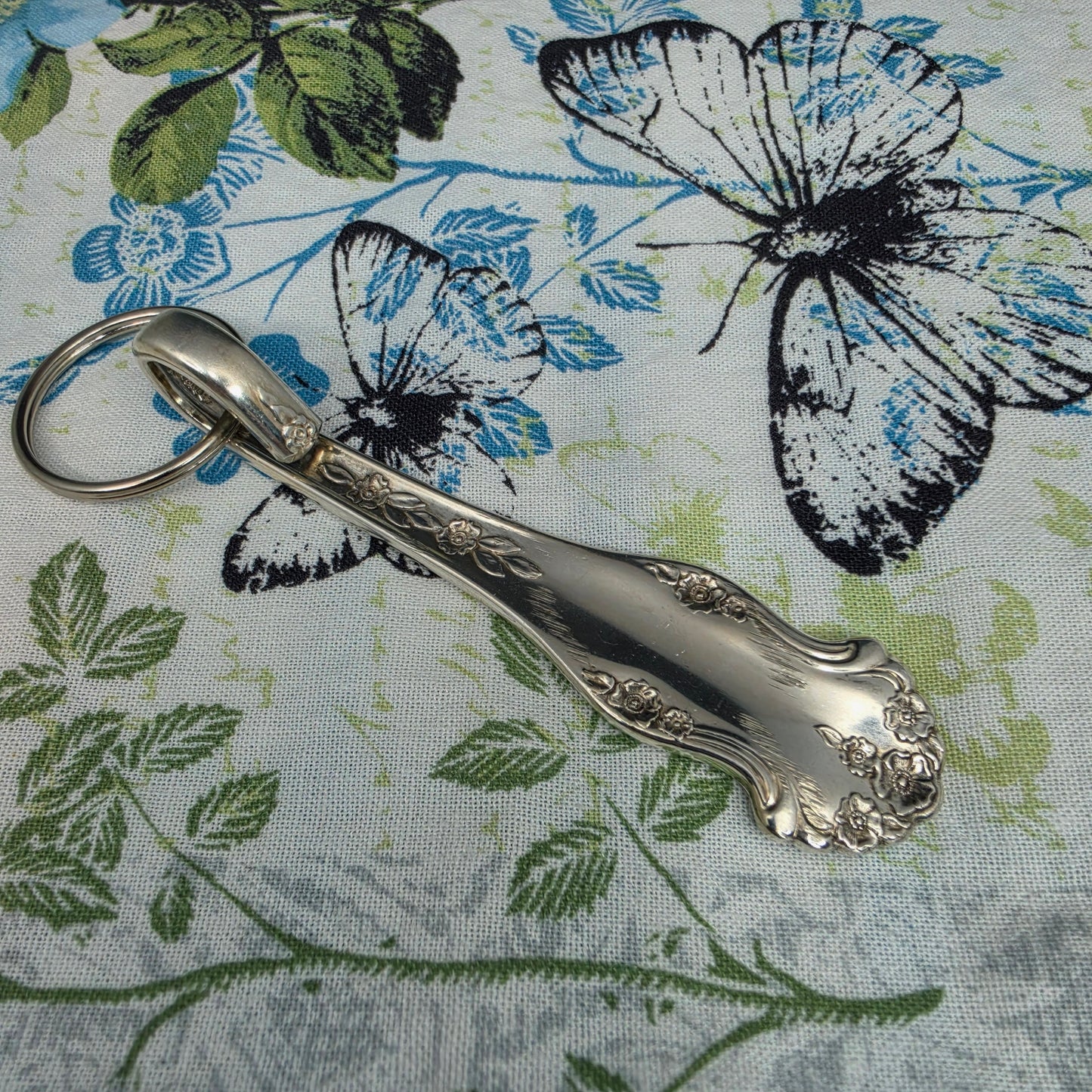 Holiday (1951) Pattern Silver Plated Keychain